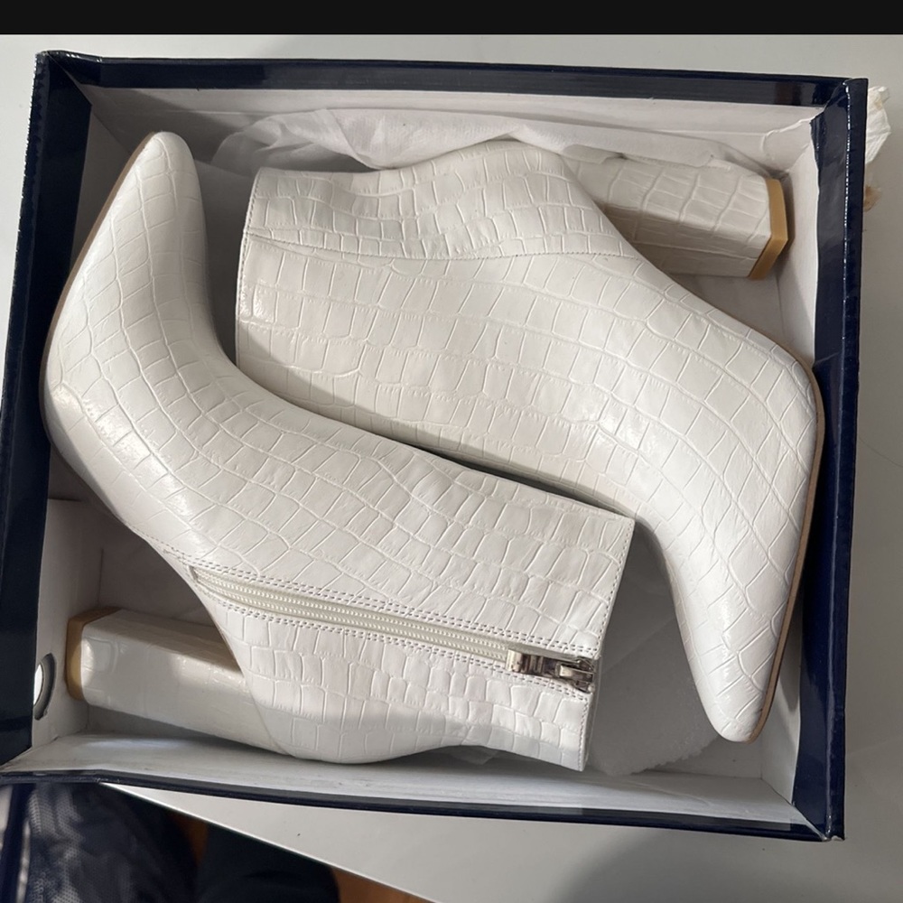 White heeled boots